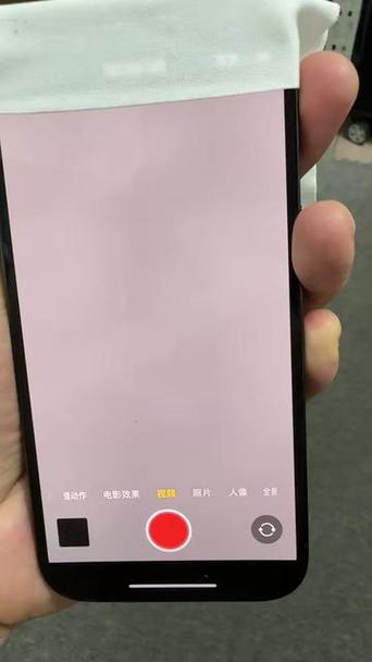 前置摄像头旁边有个小红点图标