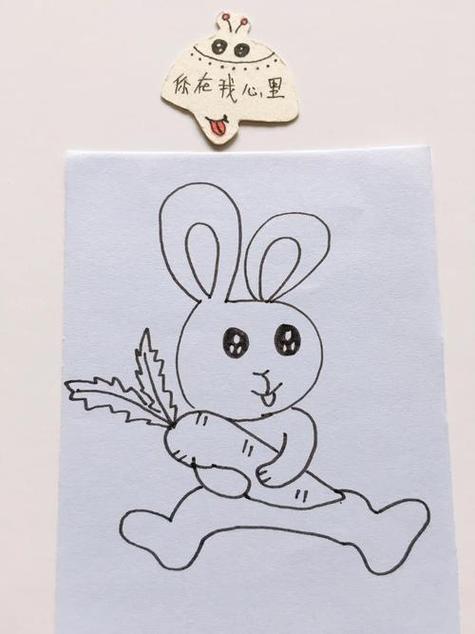 坐在地上的小白兔简笔画图标